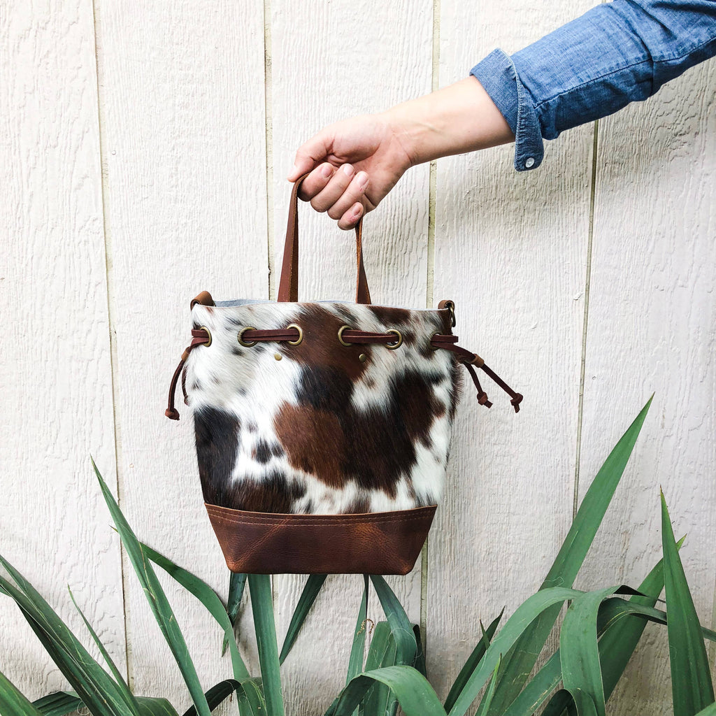 Cowhide Convertible Drawstring Backpack: Tricolor / Brown