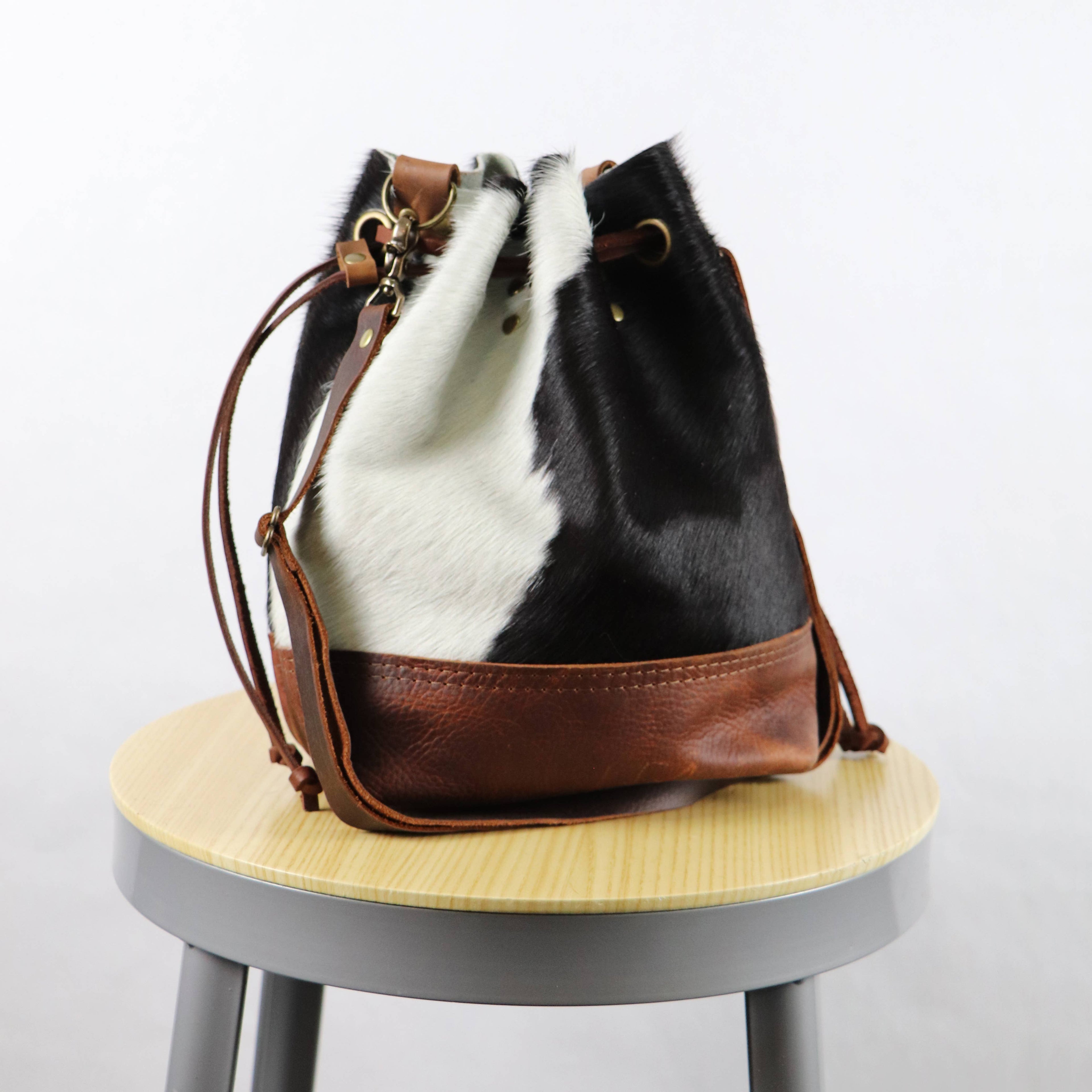 Cowhide Convertible Drawstring Backpack: Tricolor / Brown