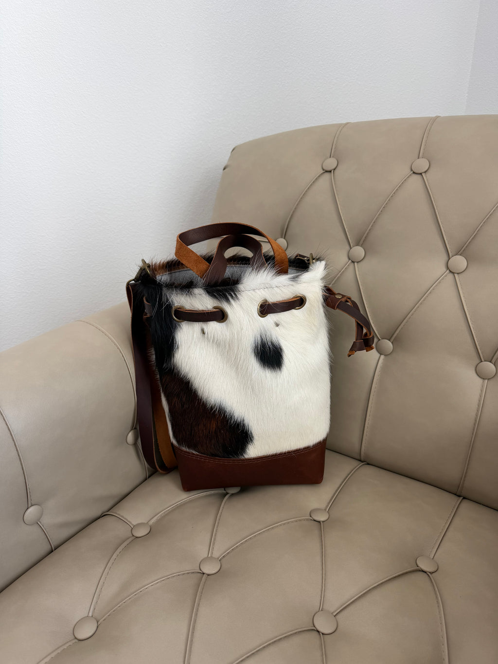 Cowhide Convertible Drawstring Backpack: Tricolor / Brown