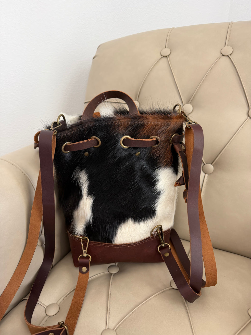 Cowhide Convertible Drawstring Backpack: Tricolor / Brown