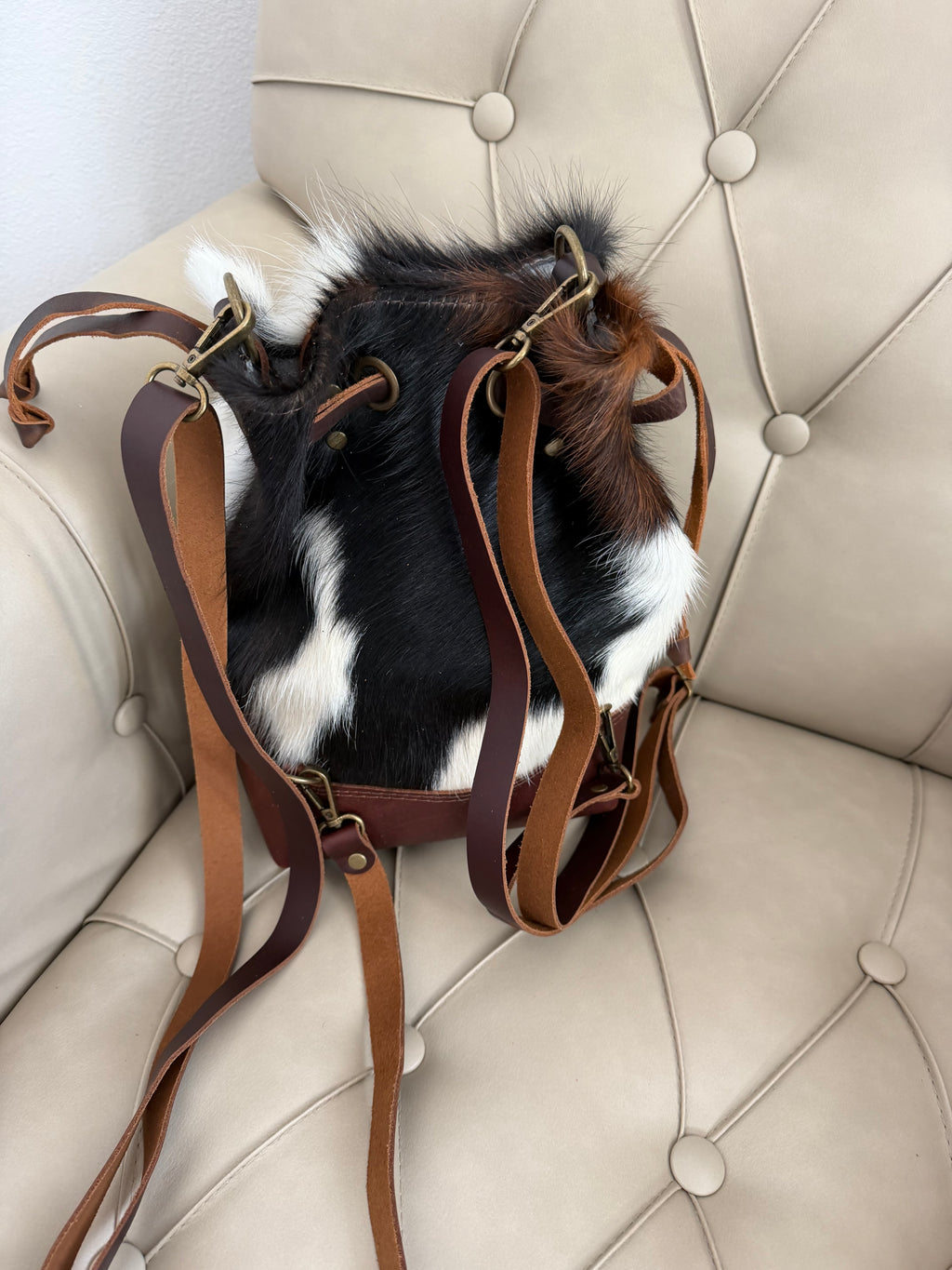 Cowhide Convertible Drawstring Backpack: Tricolor / Brown